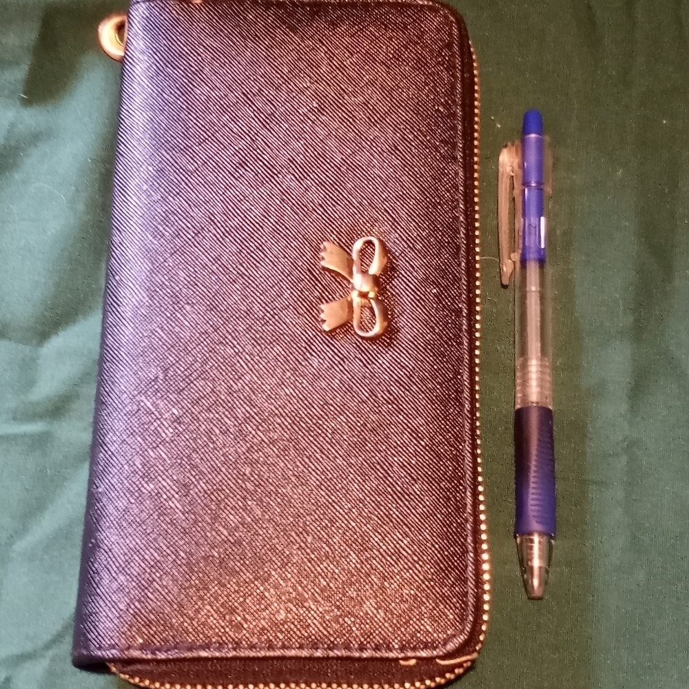 Small black clutch or wallet